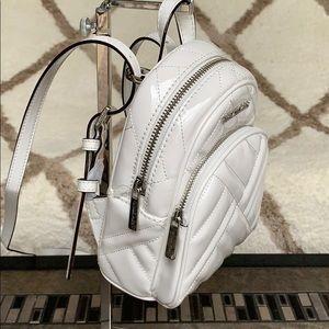 Michael kors abbey discount xs mini backpack