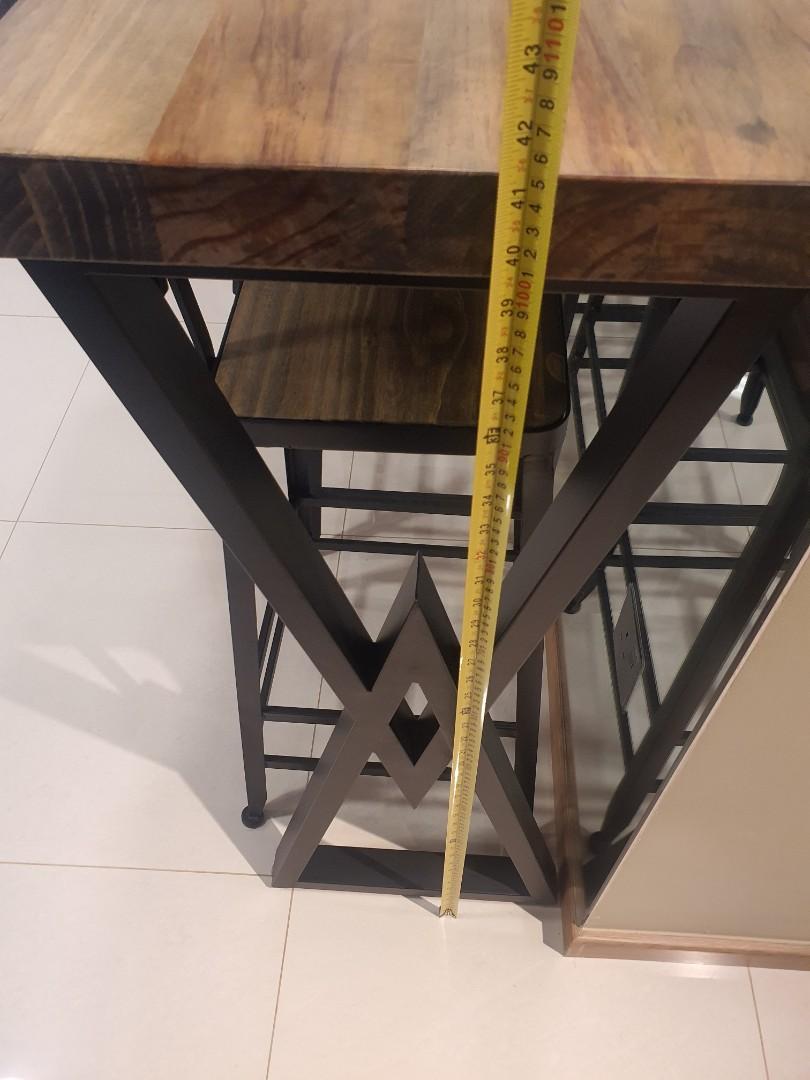 Dining Table Set (Category: Tables & Sets) located in Singapore. Submitted by bryanjosephmenon (Listing ID 1066416938, Image 3). Description: new set nvr used b4 parents only tried sitting on it once and not comfortable with it . custom made solid wood high table and high chair measurements are in pics attached, high chair also custom made to suit exact same texture and solid wood as the table. Bought it at 1k plus selling cheap cuz parents not c