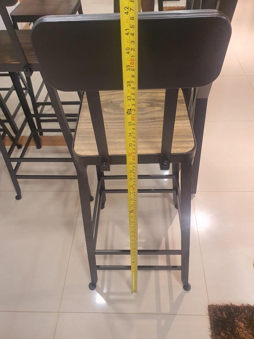 Dining Table Set (Category: Tables & Sets) located in Singapore. Submitted by bryanjosephmenon (Listing ID 1066416938, Image 2). Description: new set nvr used b4 parents only tried sitting on it once and not comfortable with it . custom made solid wood high table and high chair measurements are in pics attached, high chair also custom made to suit exact same texture and solid wood as the table. Bought it at 1k plus selling cheap cuz parents not c