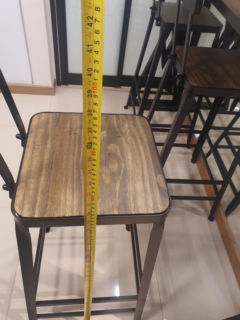 Dining Table Set (Category: Tables & Sets) located in Singapore. Submitted by bryanjosephmenon (Listing ID 1066416938, Image 1). Description: new set nvr used b4 parents only tried sitting on it once and not comfortable with it . custom made solid wood high table and high chair measurements are in pics attached, high chair also custom made to suit exact same texture and solid wood as the table. Bought it at 1k plus selling cheap cuz parents not c