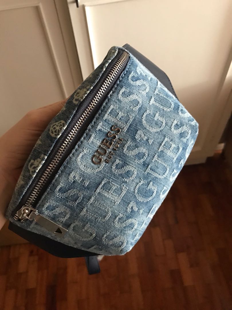 Denim embossed shop clutch guess