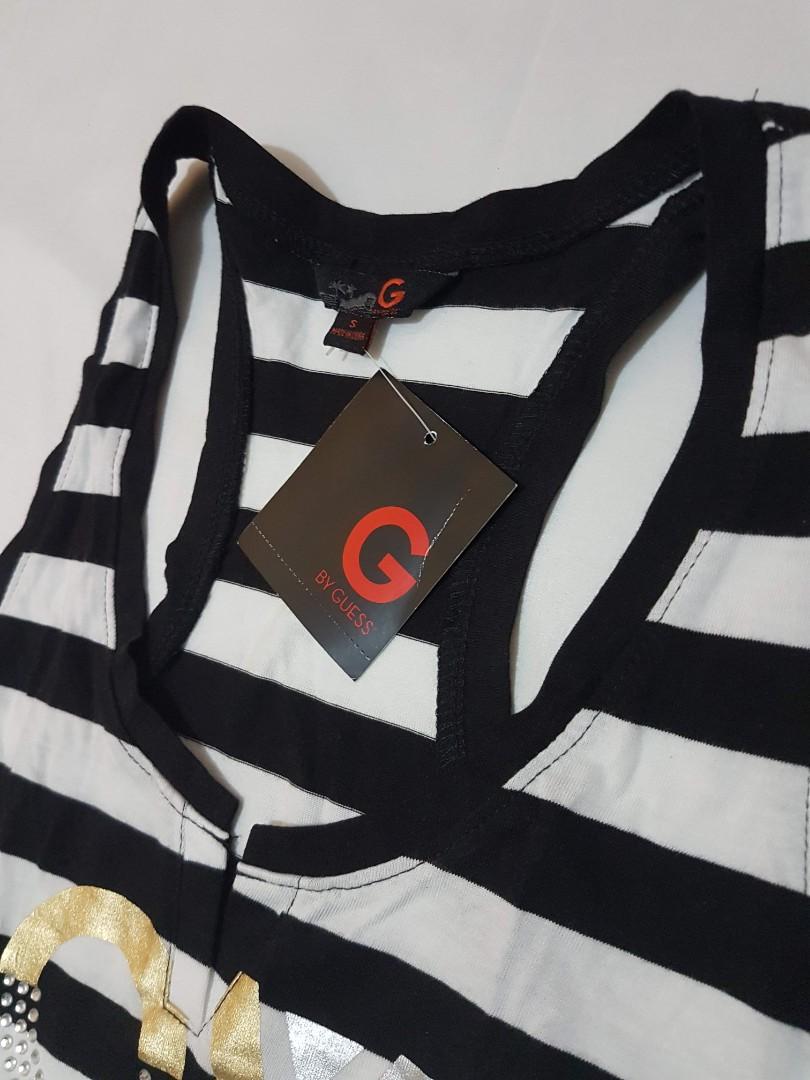 Original Guess Black white stripes Tank top (Category: Others Tops) located in Quezon City. Submitted by theabsolutelyfab (Listing ID 1066292367, Image 3). Description: Bought from New York, USA Original with tag ⭐ Can fit Small to Medium frame Small on tag MOP: Gcash/BPI/RCBC Deliver via: Grab/Lalamove Meet-up: Depending on availability Quezon City.