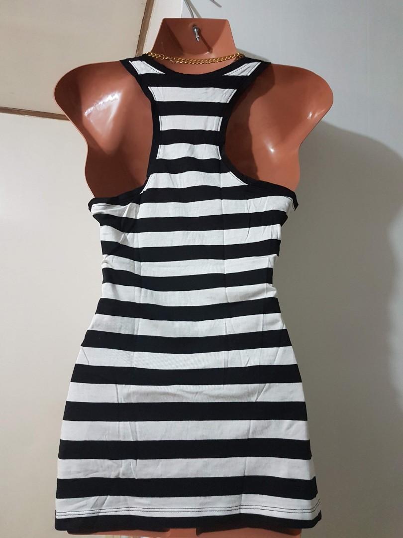 Original Guess Black white stripes Tank top (Category: Others Tops) located in Quezon City. Submitted by theabsolutelyfab (Listing ID 1066292367, Image 2). Description: Bought from New York, USA Original with tag ⭐ Can fit Small to Medium frame Small on tag MOP: Gcash/BPI/RCBC Deliver via: Grab/Lalamove Meet-up: Depending on availability Quezon City.