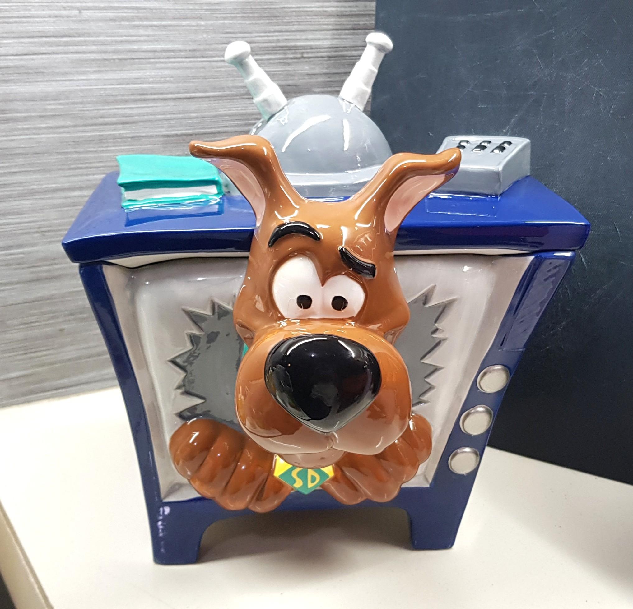 Vintage WB Scooby Doo Cookie Jar (Category: Vintage Collectibles) located in Quezon City. Submitted by happycheeeks (Listing ID 1066343490, Image 1). Description: Vintage orig bought from WB Warner Bros. Studio HK way back 90s Ceramic Displayed only pls see flaw (small chip) on the back lid no box no provincial orders 👉Last price.