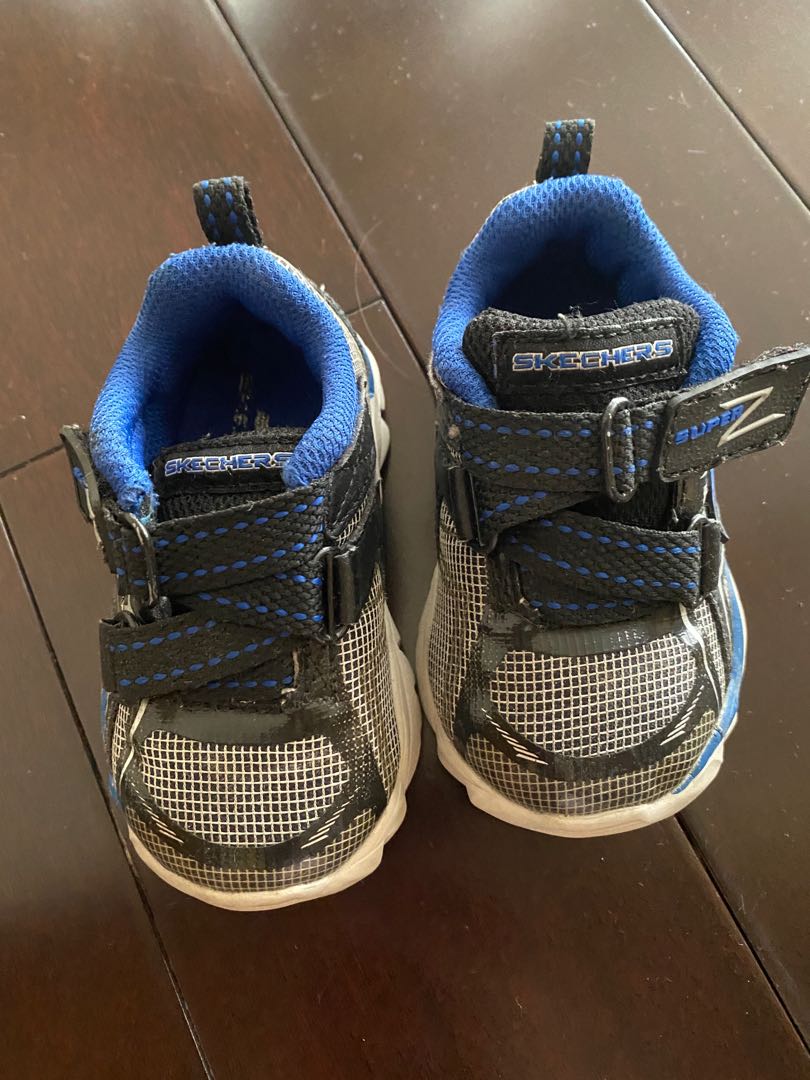 black and gray skechers