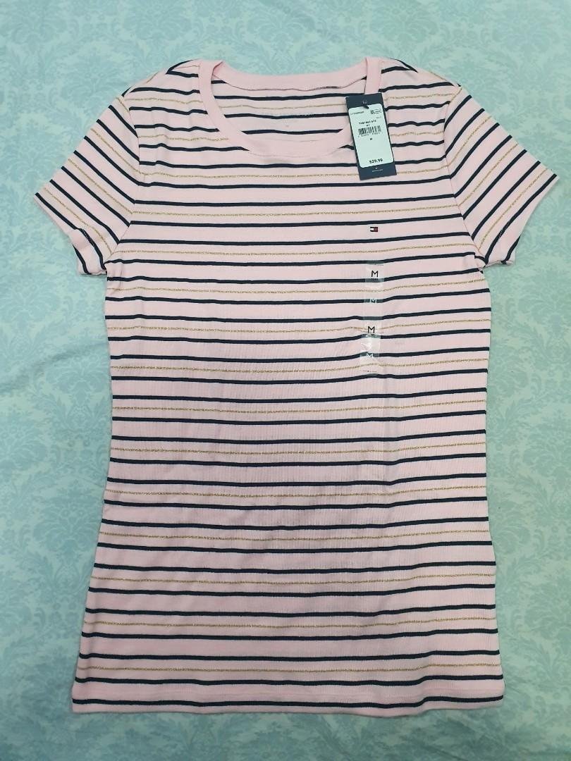 Tommy Hilfiger Pink Striped Crew Neck (Category: Others Tops) located in Quezon City. Submitted by camz_45 (Listing ID 1066323146, Image 1). Description: 100% authentic Tommy Hilfiger crew neck! Brand new with tags, never worn. See receipt! Pink striped shirt with some stretch. Slim fit, medium. Bought via pasabuy from Ontario, Canada but too small. :(.