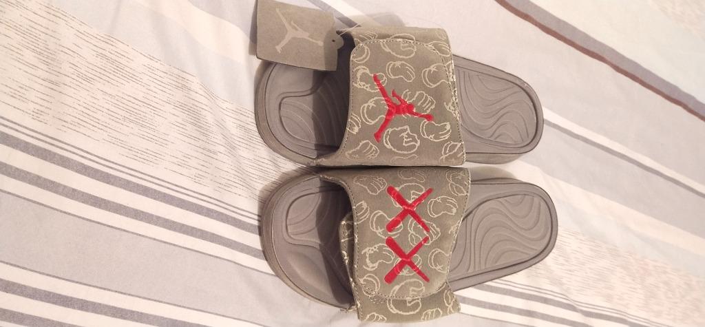 Jordan kaws slides online