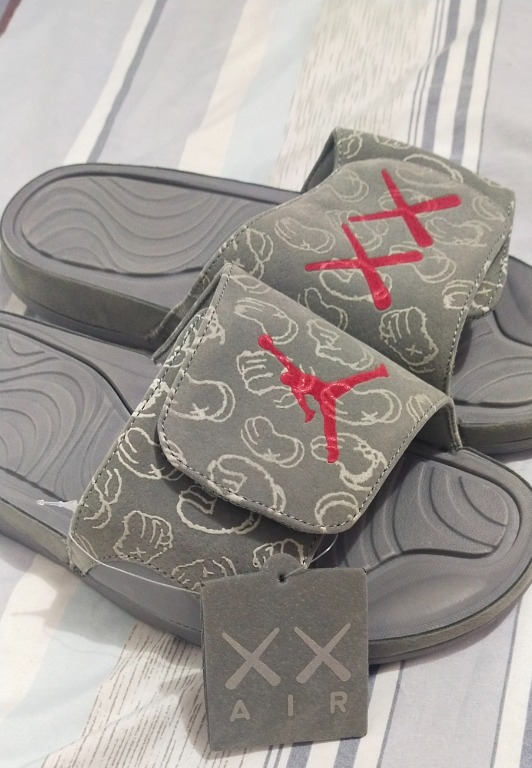 Kaws jordan slides store