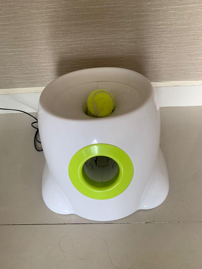 Automatic ball dispenser clearance