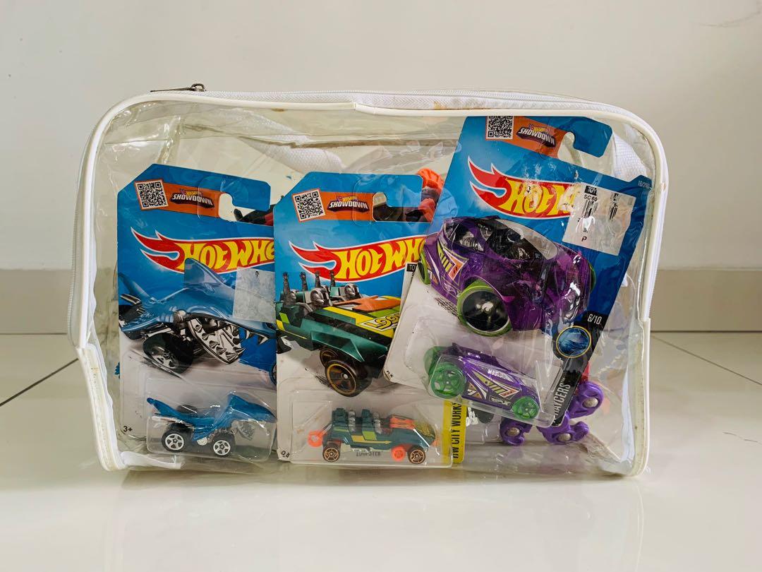 Bag of Assorted Toys including Beyblade and Hot Wheels