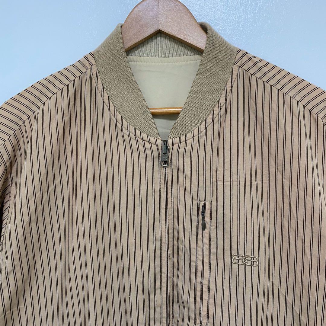 Balenciaga Reversible Bomber Jacket Vintage (Category: Coats, Jackets and Outerwear) located in Pasig City. Submitted by asmus19 (Listing ID 1066596302, Image 2). Description: Balenciaga Reversible Bomber Jacket Vintage Size 5 Fit Large-XL Chest width 24.5 inches Length 27 inches Good Condition Issue: Small burn hole.