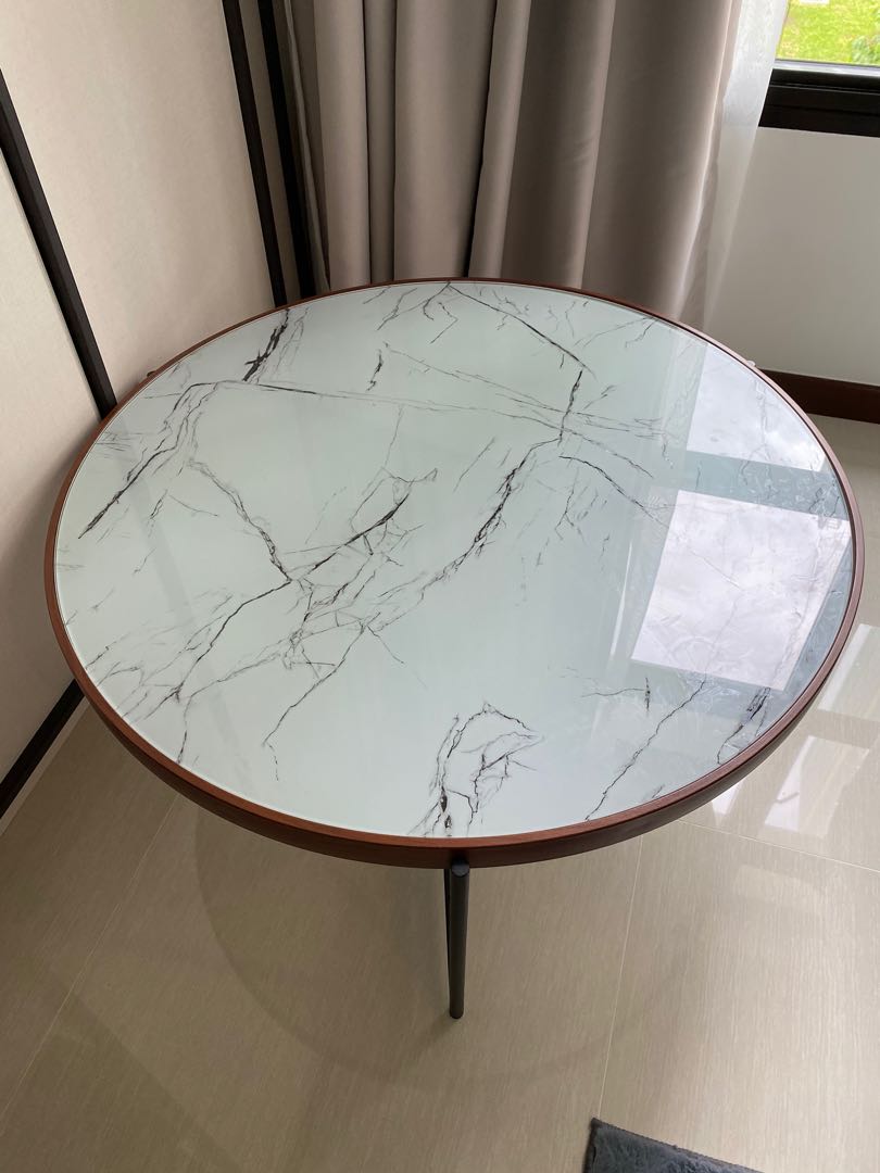 Glass top on shop marble table