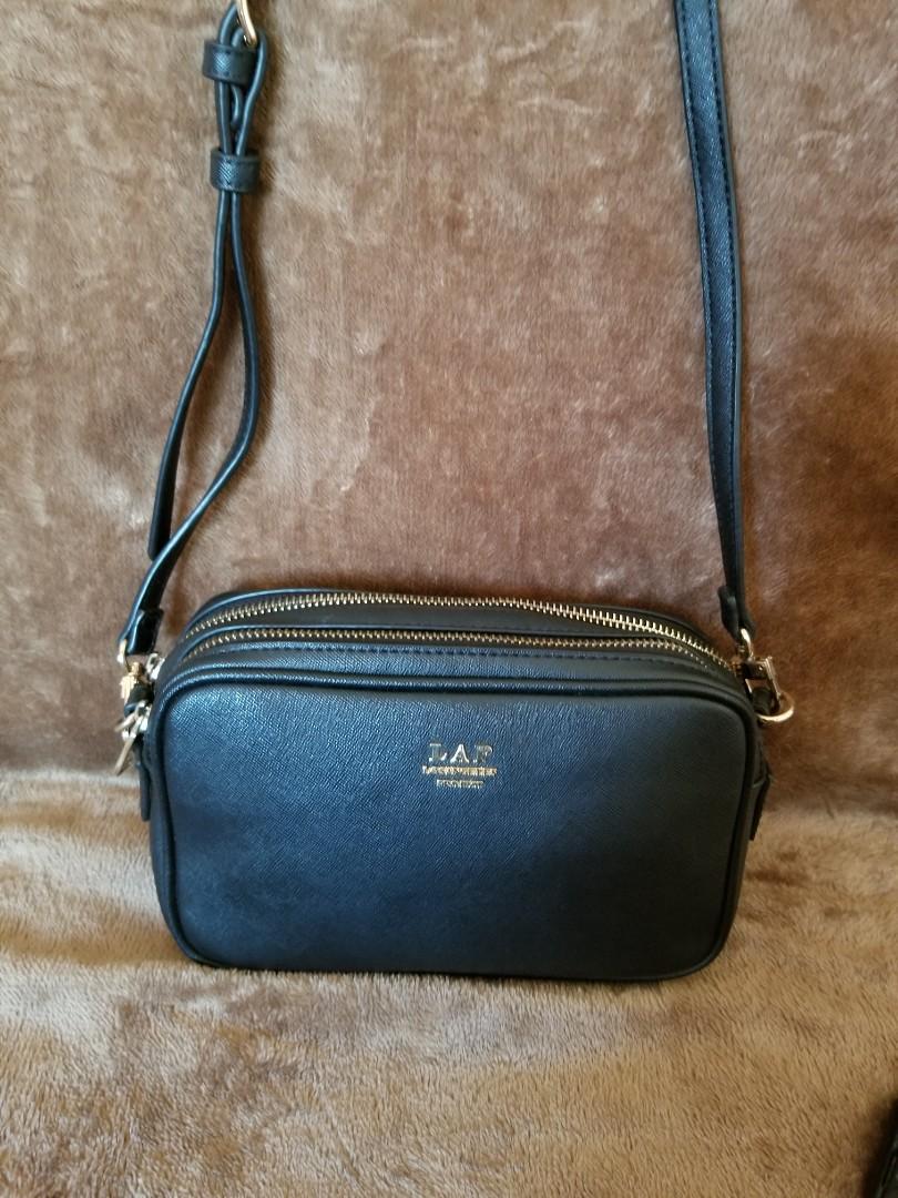 Lap shop sling bag