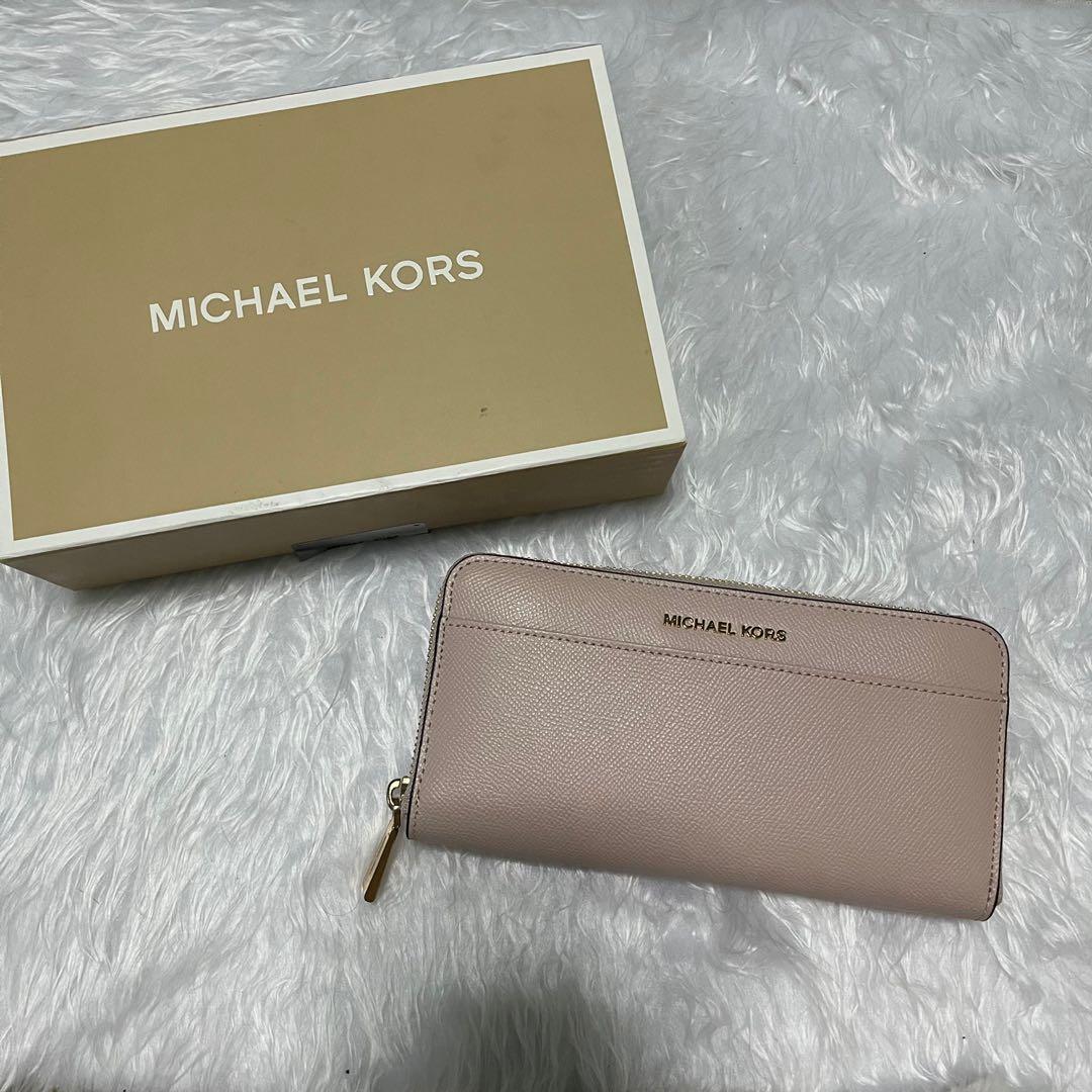 Michael Kors long wallet in Ballet Pink (Category: Luxury Bags & Wallets) located in Makati City. Submitted by glowcartph (Listing ID 1066502723, Image 1). Description: Brand new authentic Michael Kors long wallet in Ballet pink Not used Comes with box RFS: decluttering .
