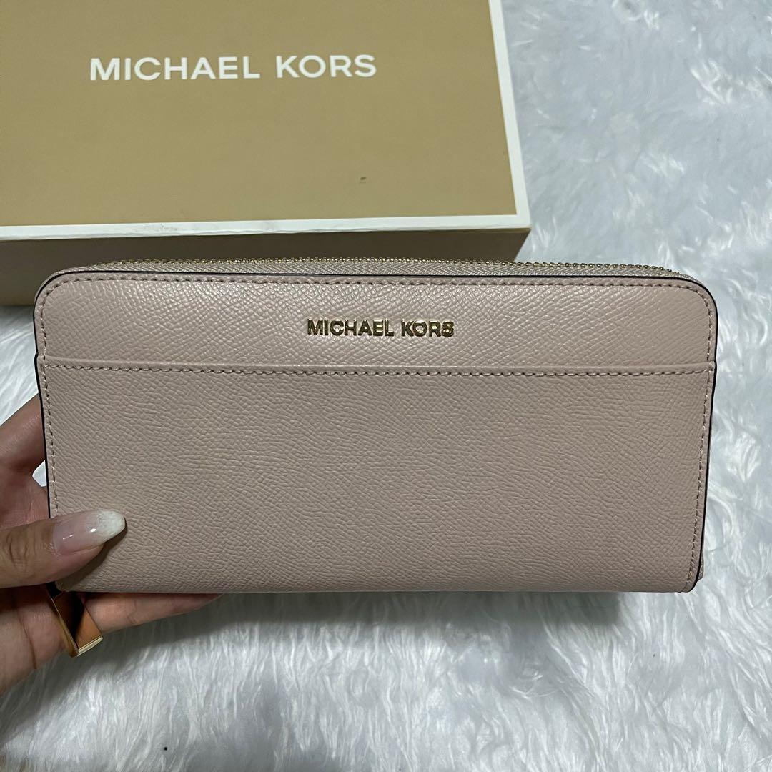 Michael Kors long wallet in Ballet Pink (Category: Luxury Bags & Wallets) located in Makati City. Submitted by glowcartph (Listing ID 1066502723, Image 3). Description: Brand new authentic Michael Kors long wallet in Ballet pink Not used Comes with box RFS: decluttering .