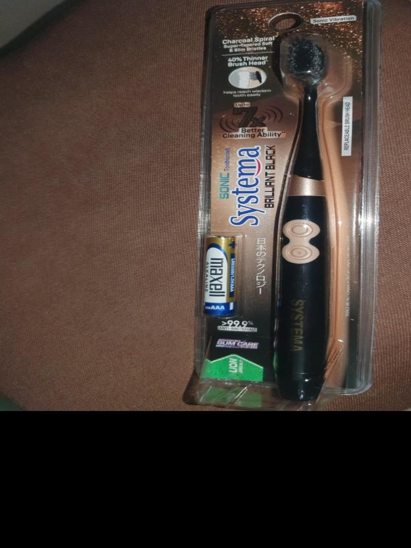 systema sonic brilliant black toothbrush