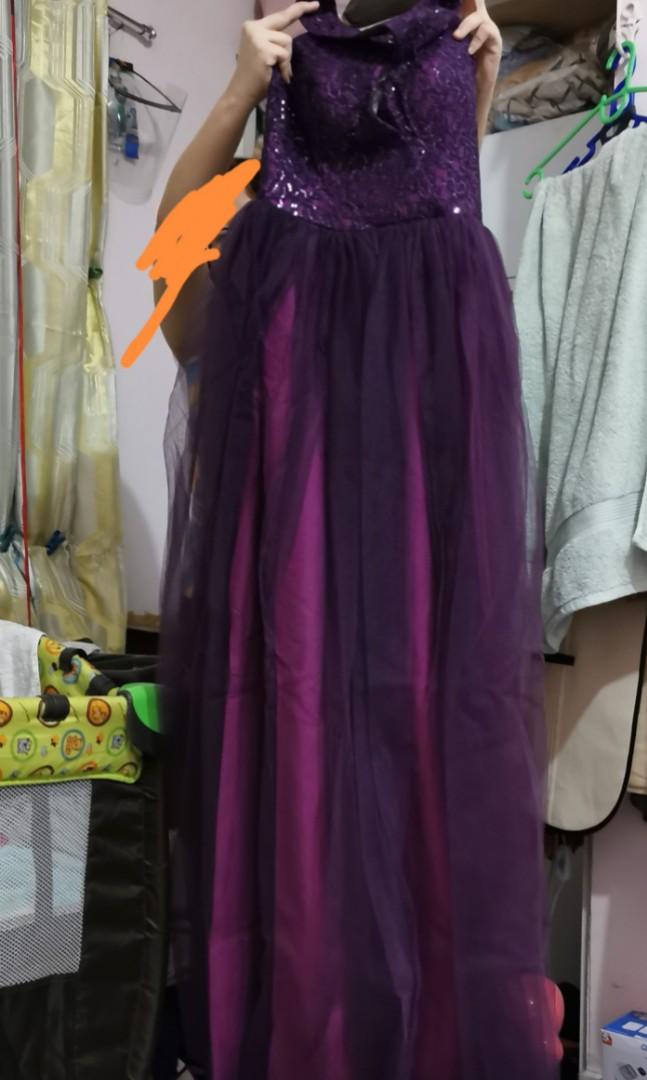 Violet Long Formal Gown Ball (Category: Evening dresses & gowns) located in Quezon City. Submitted by professional.declutterer (Listing ID 1066667304, Image 3). Description: Violet Long Gown Used twice only fits small - medium frames super nice in actual, kung pwede ko lang ulitin haha kaso naka-2x na akong suot nito and wala naman akong occasion na aattendan recently 😅 MOP: BDO/BPI/Gcash/Paymaya Location: Roosevelt QC RFS: decluterring and for 