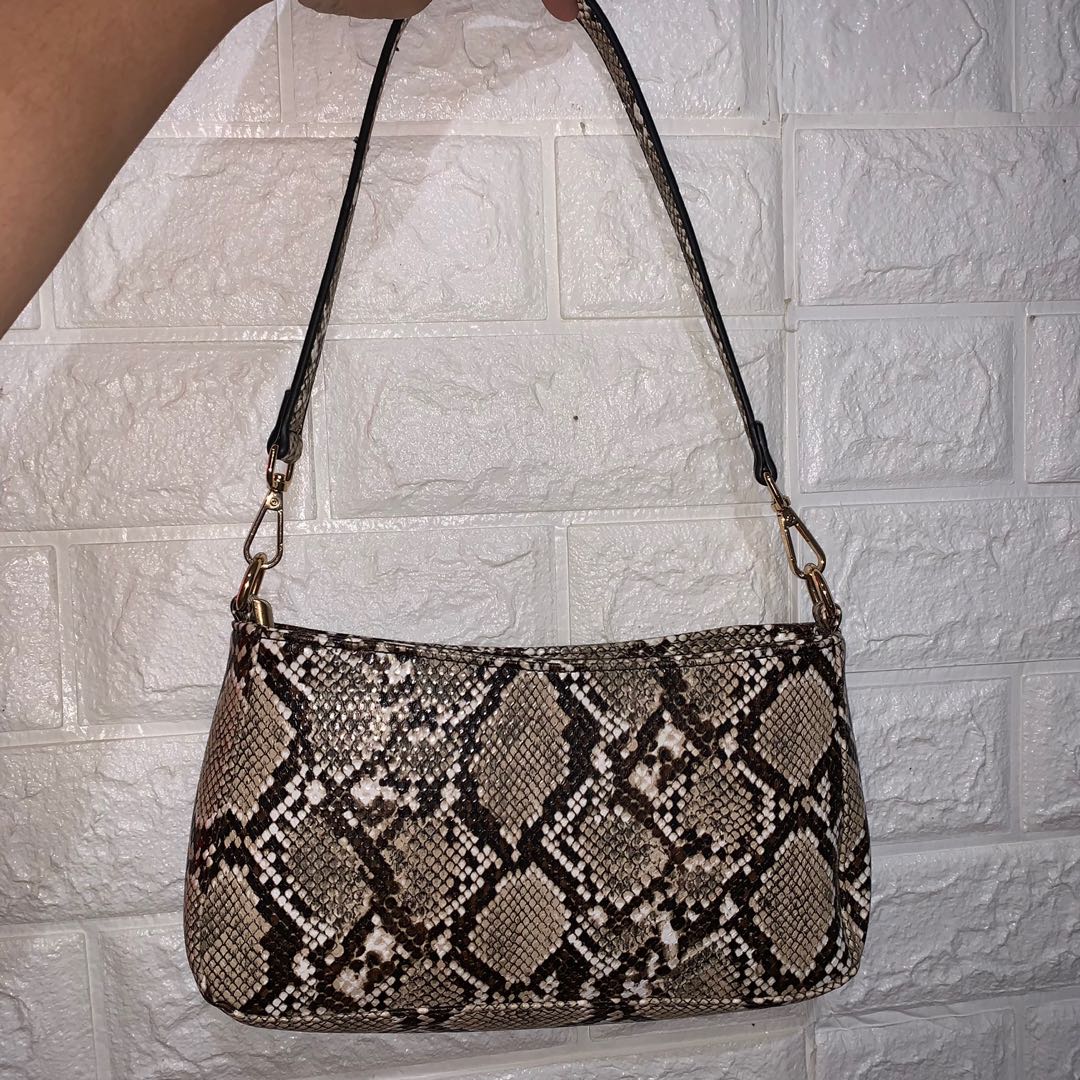 Snake print baguette bag sale
