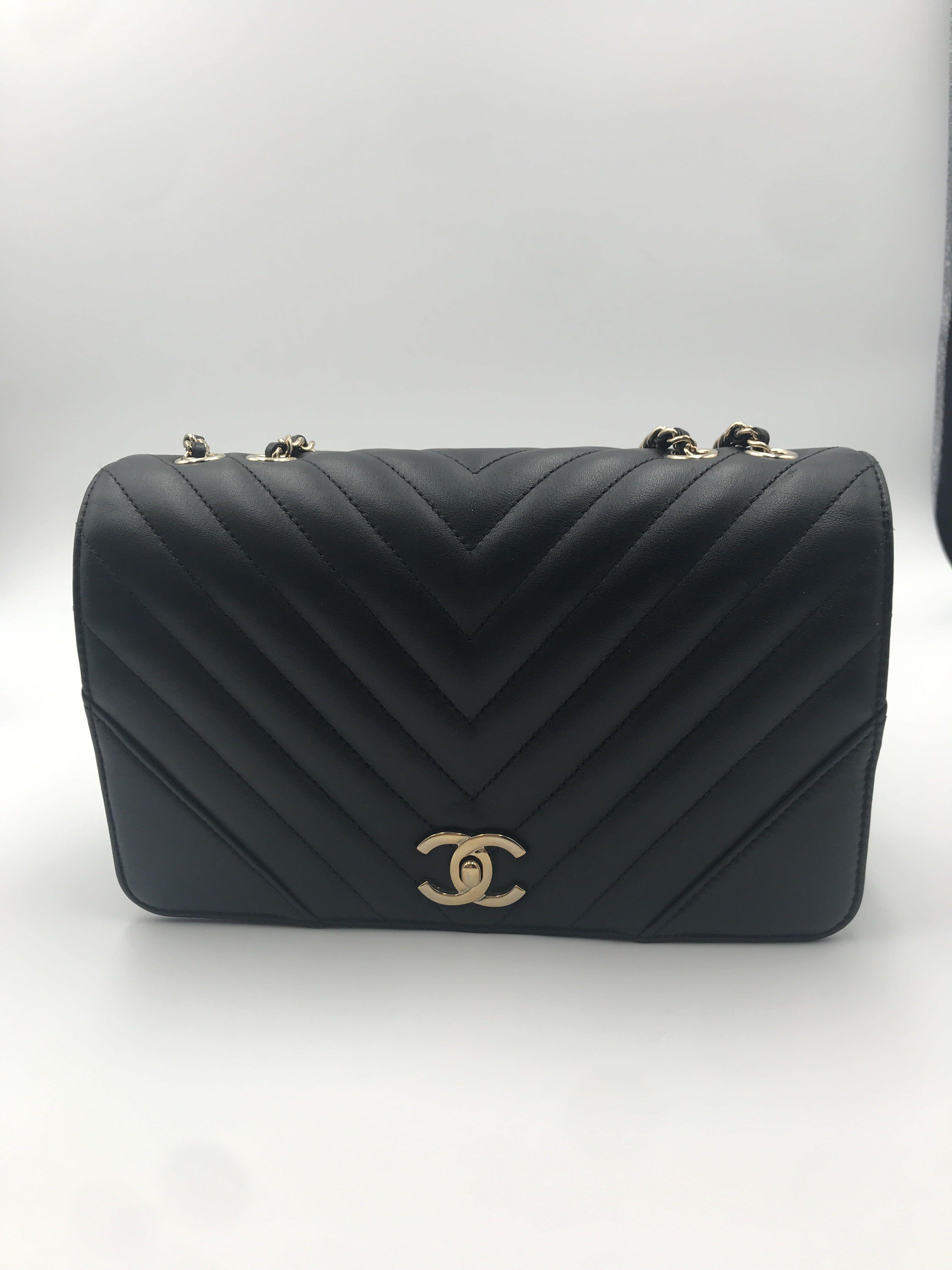 chanel chevron statement flap bag