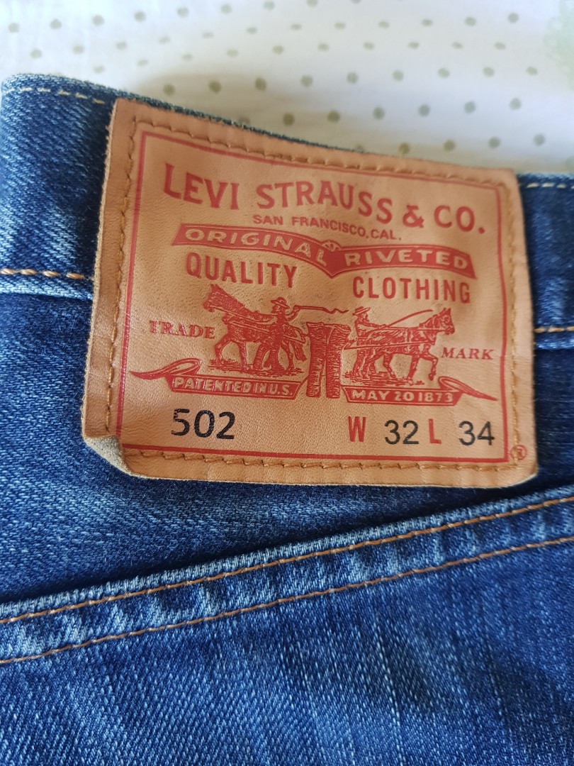 LEVI'S 502 SIZE 32, Men's Fashion, Bottoms, Jeans on Carousell
