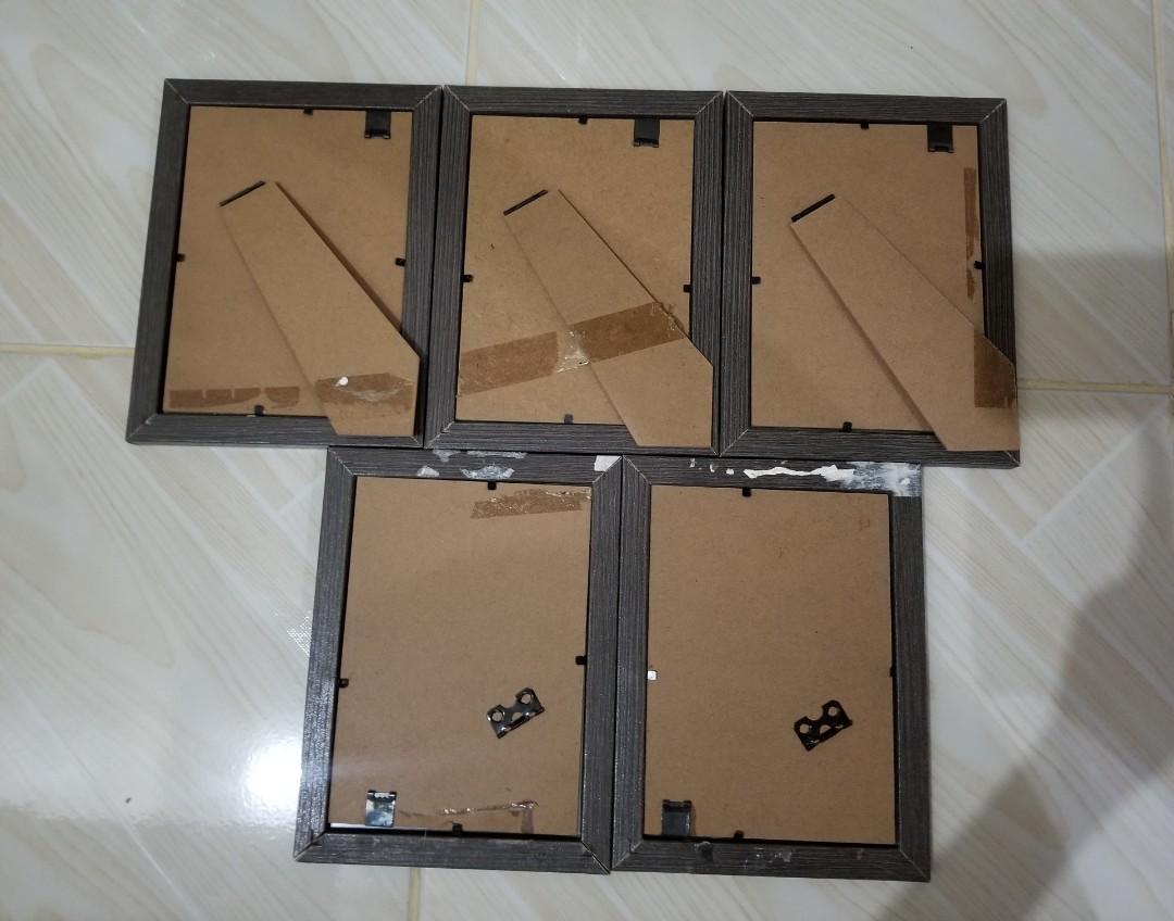 TAKE ALL 5 SMALL FRAMES (Category: Storage Boxes & Baskets) located in Quezon City. Submitted by resells_choice (Listing ID 1060766801, Image 3). Description: stand or wall frames Still in good conditions bought from SM Dept store wooden & glass material color: Dark Gray 3/4R estimated size Guaranteed good quality pick up in cubao.