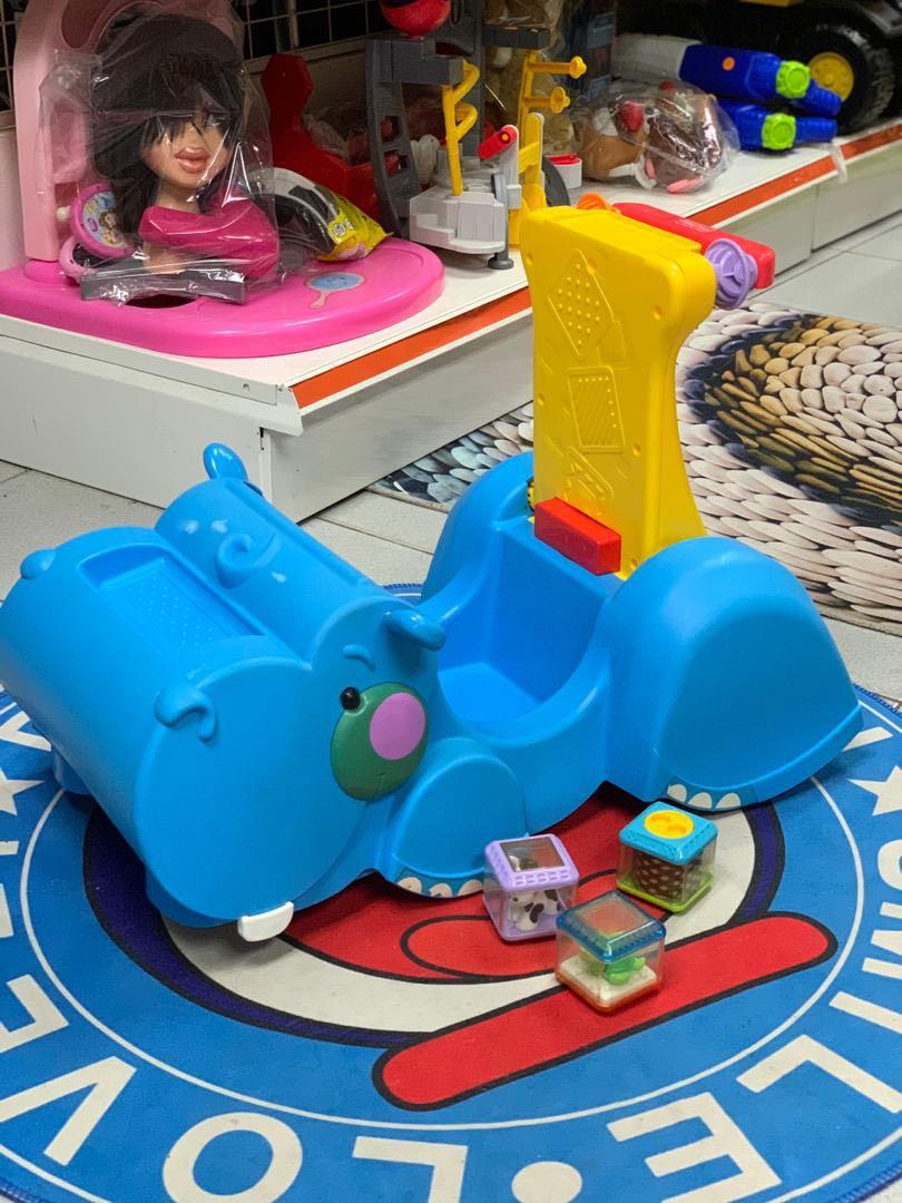 Fisher price gobble hot sale and go hippo