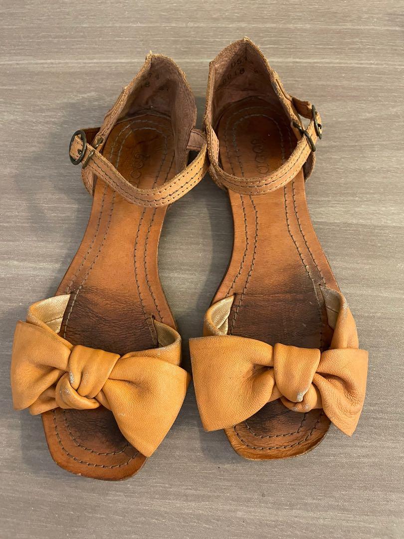 Leather ribbon sandals and BCBG flats size 7 (Category: Flats & Sandals) located in Manila. Submitted by urban_clothing (Listing ID 1061100891, Image 2). Description: Price for 2 pairs already. Both size 7 a leather sandals and a silver BCBG flats.