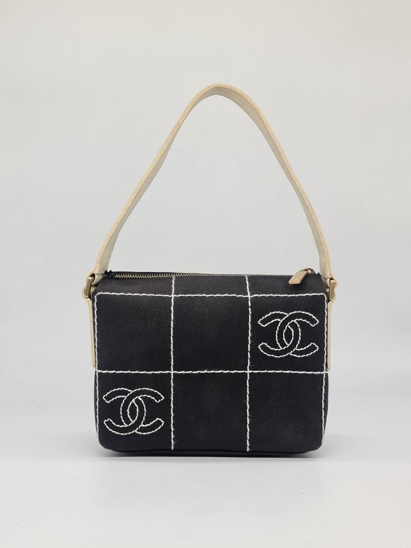 Chanel - CC Wild Stitch Pochette (Category: Luxury Bags & Wallets) located in Manila. Submitted by buynflex (Listing ID 1061425473, Image 1). Description: Authentic and Very Rare Chanel CC Wild Stitch Pochette Size Small Measurements: L 7.5 x W 5.5 x 2.5 inches Gently Used Minor Marks sa Handle (Can be Restored) Minor Repair on Zipper Lock.