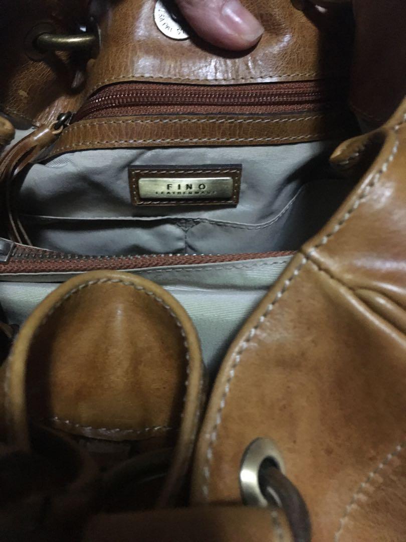 Fino Leather Bag (Category: Luxury Bags & Wallets) located in Quezon City. Submitted by limebasil (Listing ID 1061459560, Image 3). Description: Leather Handbag No flaws 2 compartments with interior zipped pocket 2 side pockets .
