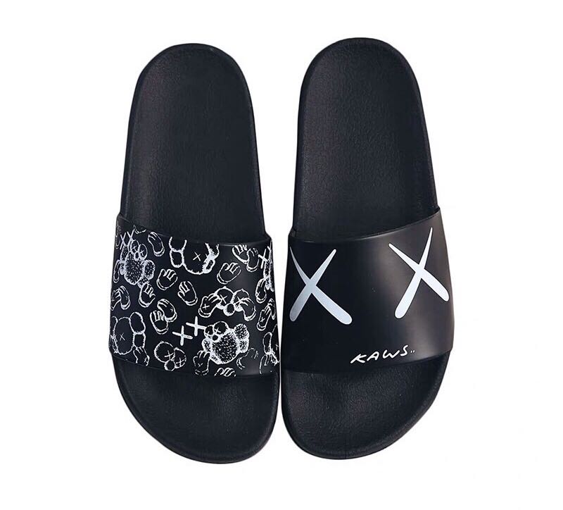 slides kaws