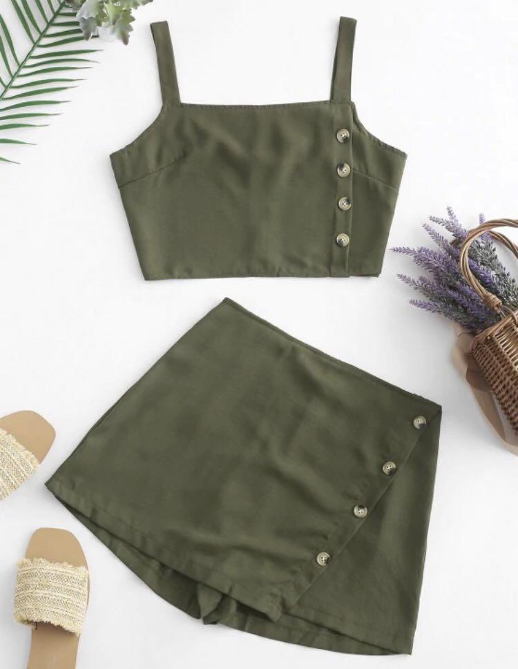 Buttons Crop Top and Overlap Shorts Set (Category: Other Bottoms) located in Pasig City. Submitted by sfrisco (Listing ID 1061590075, Image 1). Description: Newly Bought, Unused, Good condition.