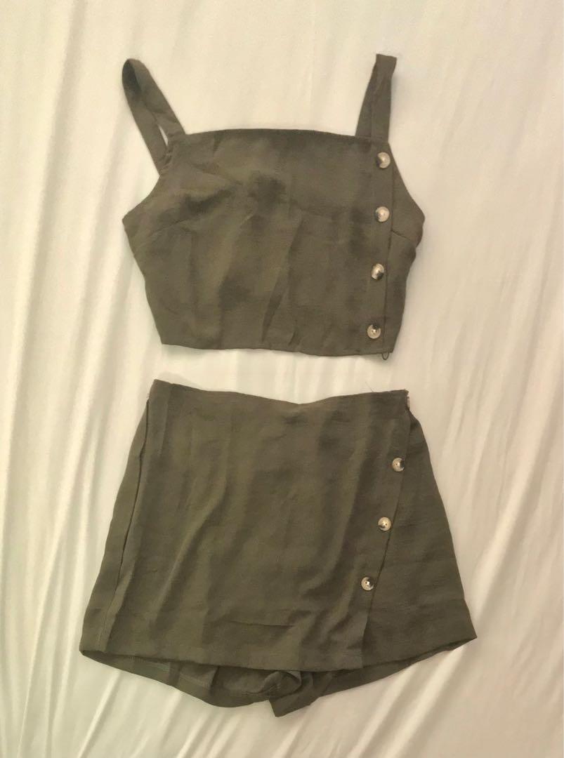 Buttons Crop Top and Overlap Shorts Set (Category: Other Bottoms) located in Pasig City. Submitted by sfrisco (Listing ID 1061590075, Image 2). Description: Newly Bought, Unused, Good condition.