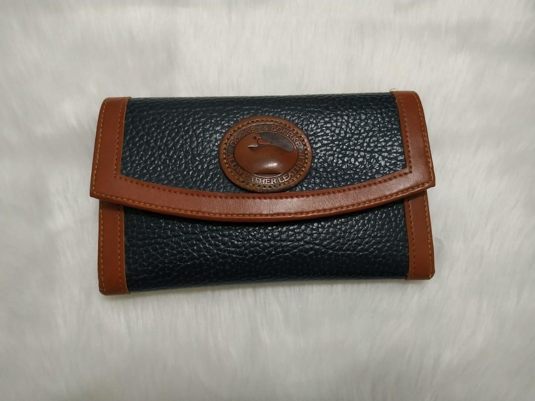 Dooney & Bourke Leather Wallet (Category: Luxury Bags & Wallets) located in Pasig City. Submitted by mxbutterfly (Listing ID 1061685144, Image 1). Description: 100% Original True leather. All pockets and parts are usable and it is very durable 👍 In a good condition however there are some signs of usage. Price is the best already, take it or leave it to my drawer chest 😅 #DeclutteringThe2020Stuffs.