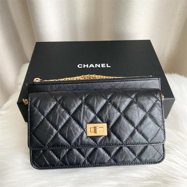 Authentic Chanel 2.55 Reissue WOC in Black Distressed Calfskin Aged GHW,  Luxury, Bags & Wallets on Carousell