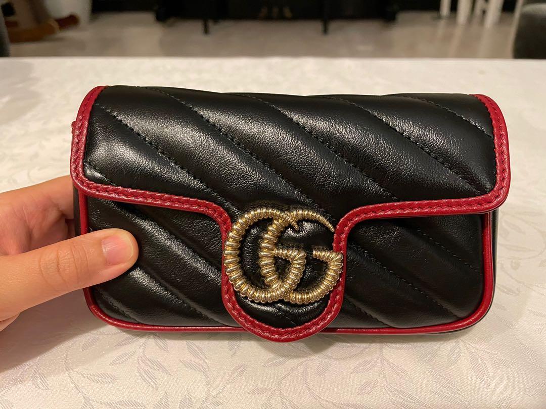 Authentic Gucci super mini marmont in black and red trim