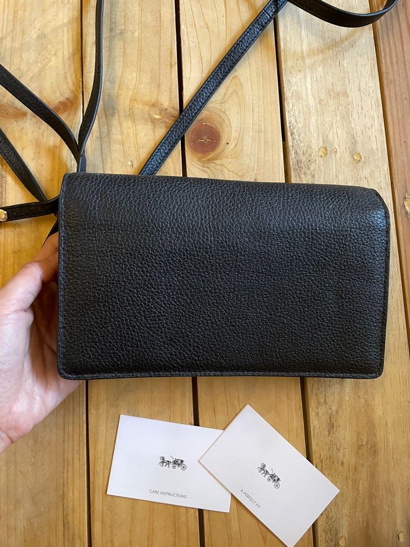 Coach flap wallet on chain (Category: Luxury Bags & Wallets) located in Lipa City. Submitted by lifestyled (Listing ID 1116865007, Image 2). Description: Brand new and unused Coach flap wallet on chain With Detachable long straps With multiple card slots and zipped compartment Can double as purse Black grossgrain leather 💯 Authentic Note: has been on storage with some minor scuffs on the inner flap and corner (refer to pic) .