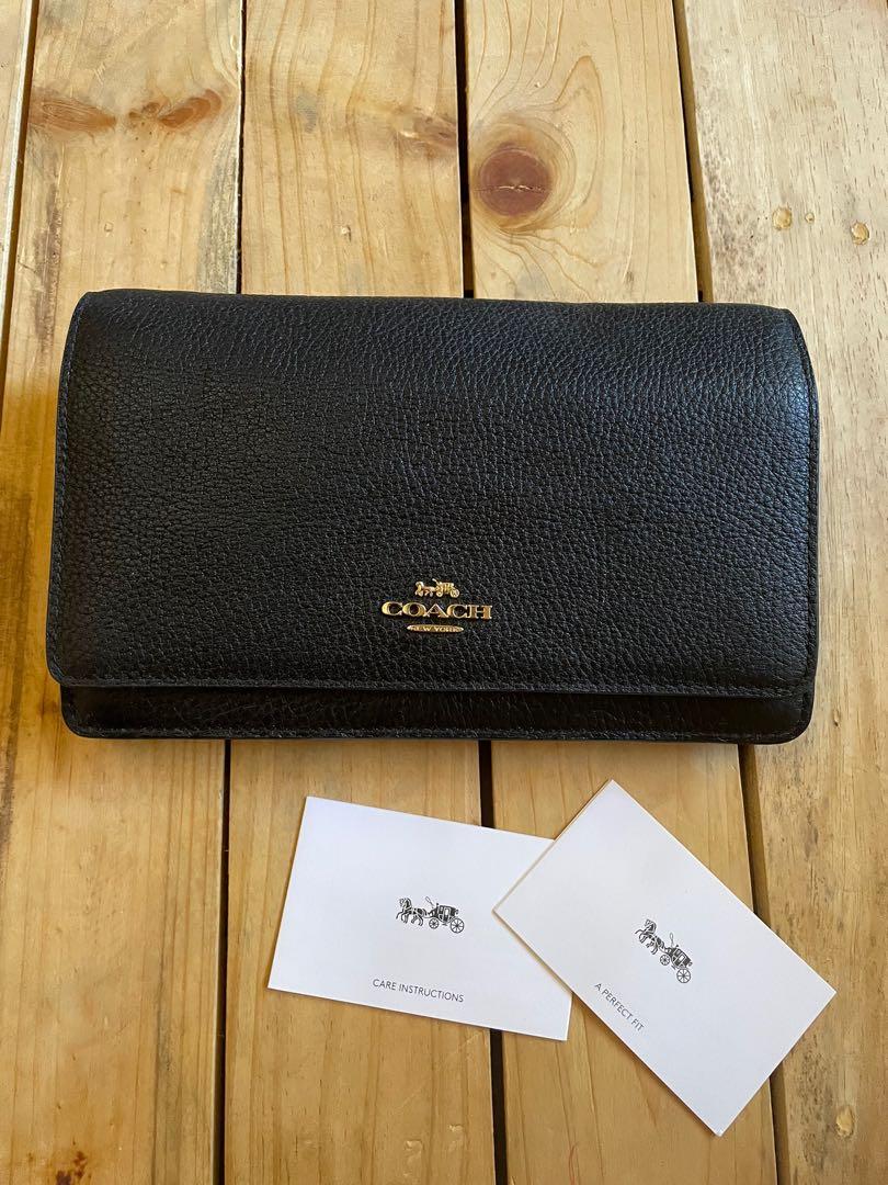 Coach flap wallet on chain (Category: Luxury Bags & Wallets) located in Lipa City. Submitted by lifestyled (Listing ID 1116865007, Image 3). Description: Brand new and unused Coach flap wallet on chain With Detachable long straps With multiple card slots and zipped compartment Can double as purse Black grossgrain leather 💯 Authentic Note: has been on storage with some minor scuffs on the inner flap and corner (refer to pic) .