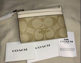 Coach wallet repriced 