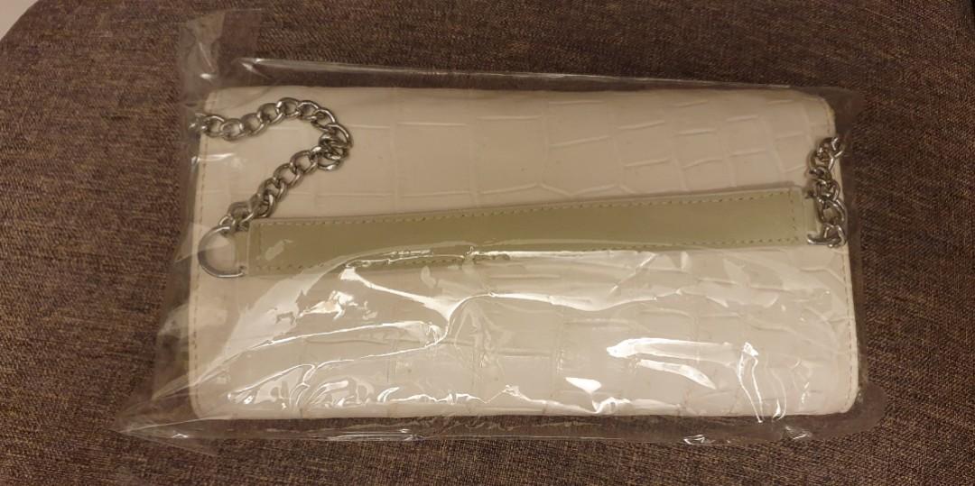 Genuine Himalayan Crocodile (Category: Luxury Bags & Wallets) located in Cabanatuan. Submitted by k2_boutiqueshop (Listing ID 1116859148, Image 2). Description: brandnew genuine himalayan crocodile wallet on chain fits cp inside silver hardware.