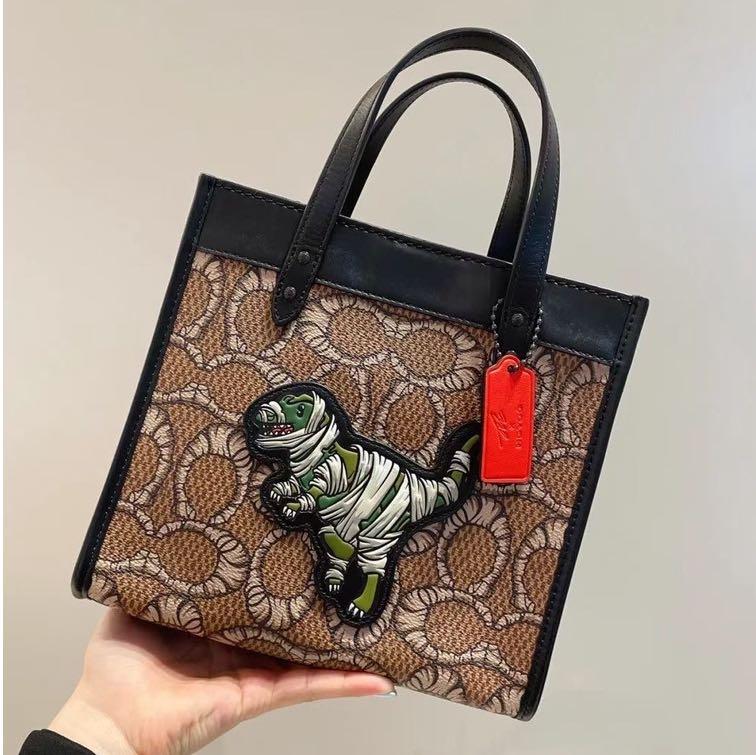 Coach bag with dinosaur deals