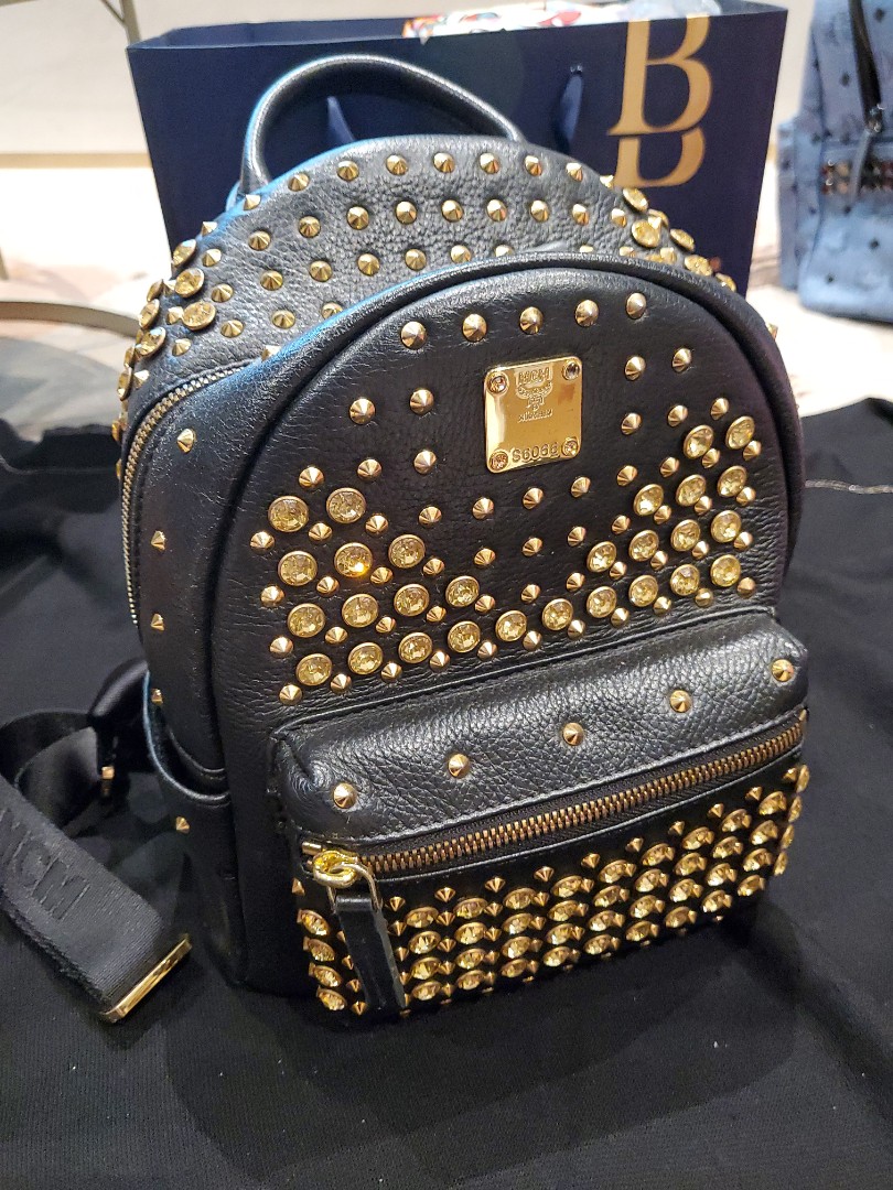 Black and gold mcm bag outlet