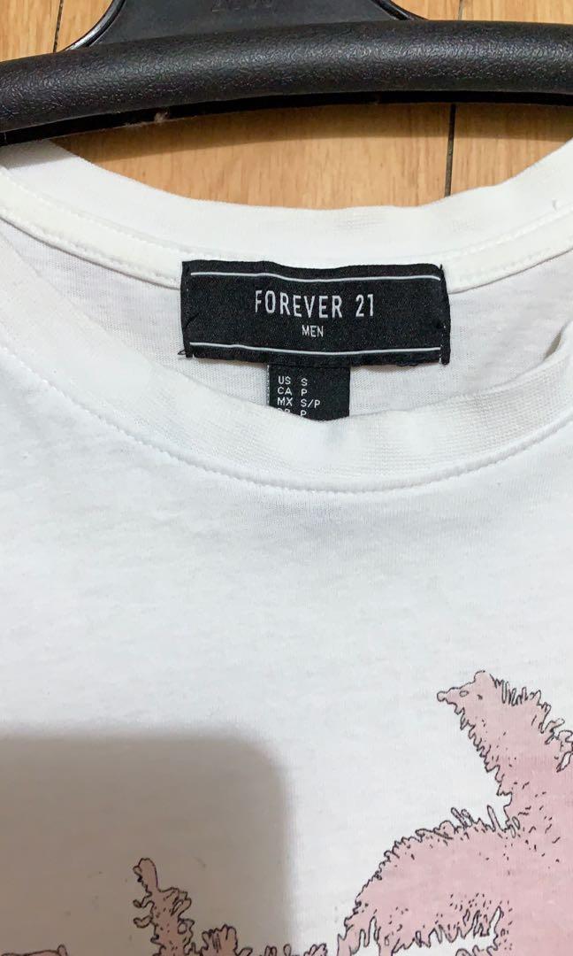 White H&M pink graphic Tee (Category: Tshirts & Polo Shirts ) located in Paranaque City. Submitted by chippycoco (Listing ID 1118704286, Image 2). Description: Slightly used. Kinda oversized. M - L Sf at buyers expense.