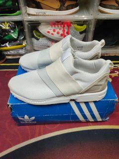 9.5uk original adidas slip on prelove with boxs.. excellent