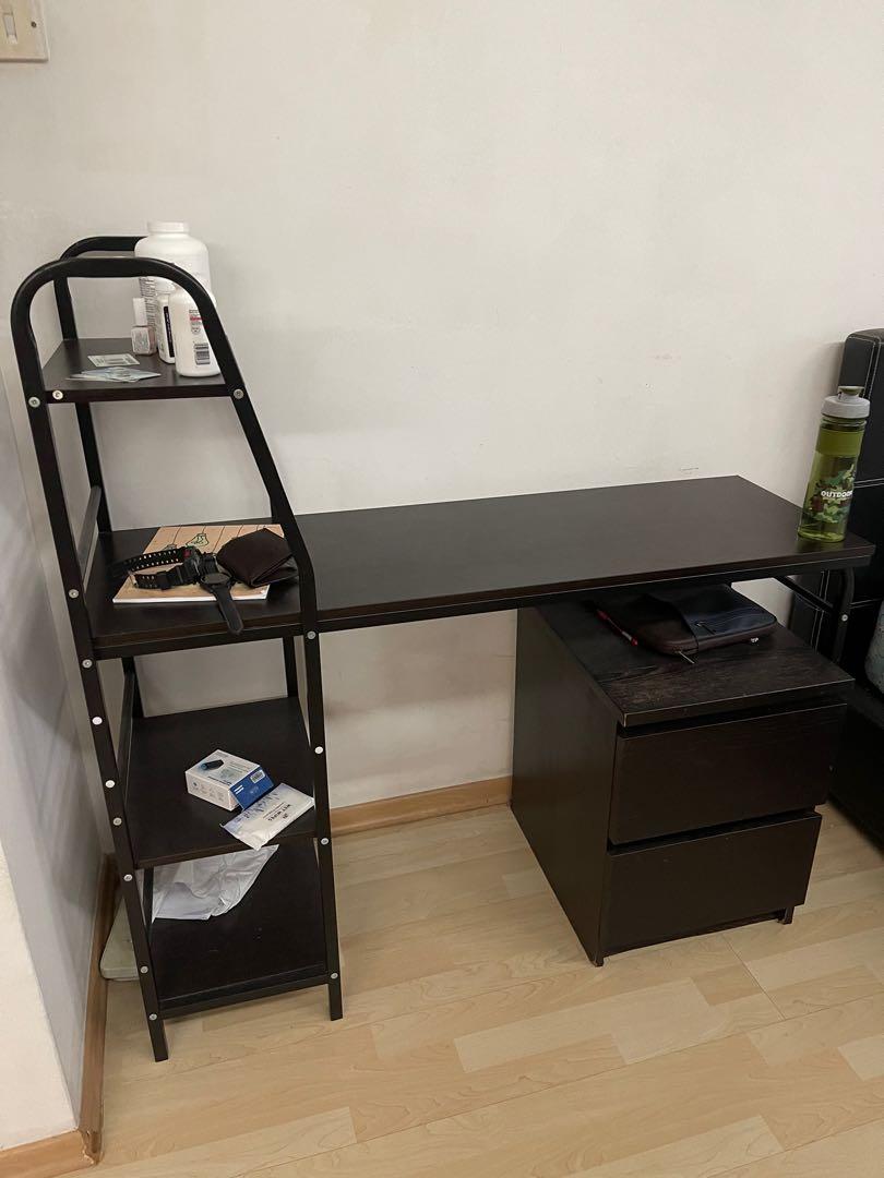 Compact Study table (Category: Tables & Sets) located in Singapore. Submitted by realdealonly (Listing ID 1118896859, Image 1). Description: Compact Study Table for sale Colour: Dark Walnut **exclude the 2 drawer shelves shown in photo** Does not come with chair when purchased. Measurements: L120XB30xH75cm(writing height). Can be dismantled for easy transport. Self arrange pick up. .