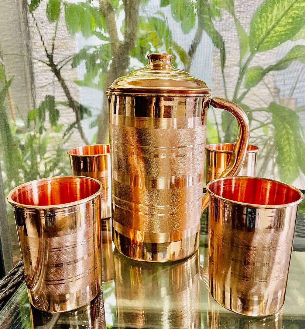 Pure Copper Water Pitcher Jug with 4 glass (Category: Other Kitchenware & Tableware) located in Marikina City. Submitted by dgoldhub (Listing ID 1118849921, Image 2). Description: 1 pc - 1.5 L jug 4 pcs - 300 ml glass Made with Pure Copper From India Additional glass - plus Ps 450.00.