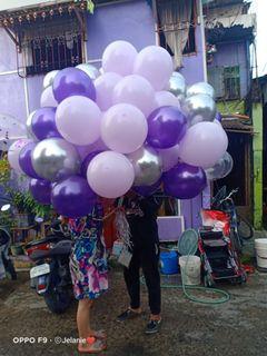 purple helium flying balloon
