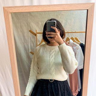 white cable sweater