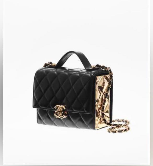 chanel bag with gold plate on top