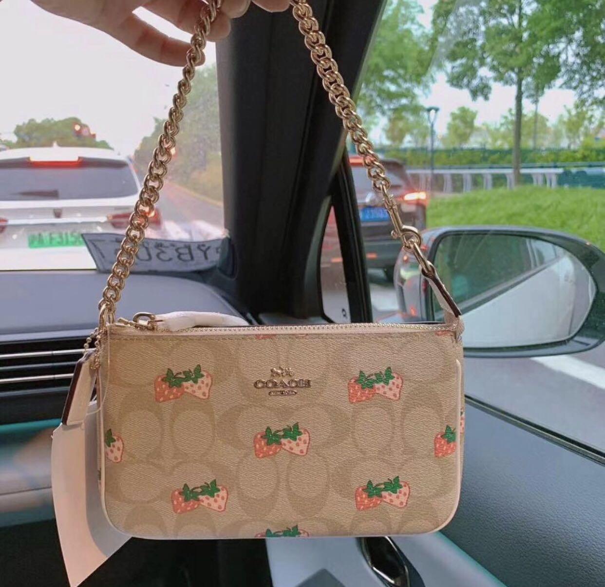 Coach wristlet with gold chain new arrivals