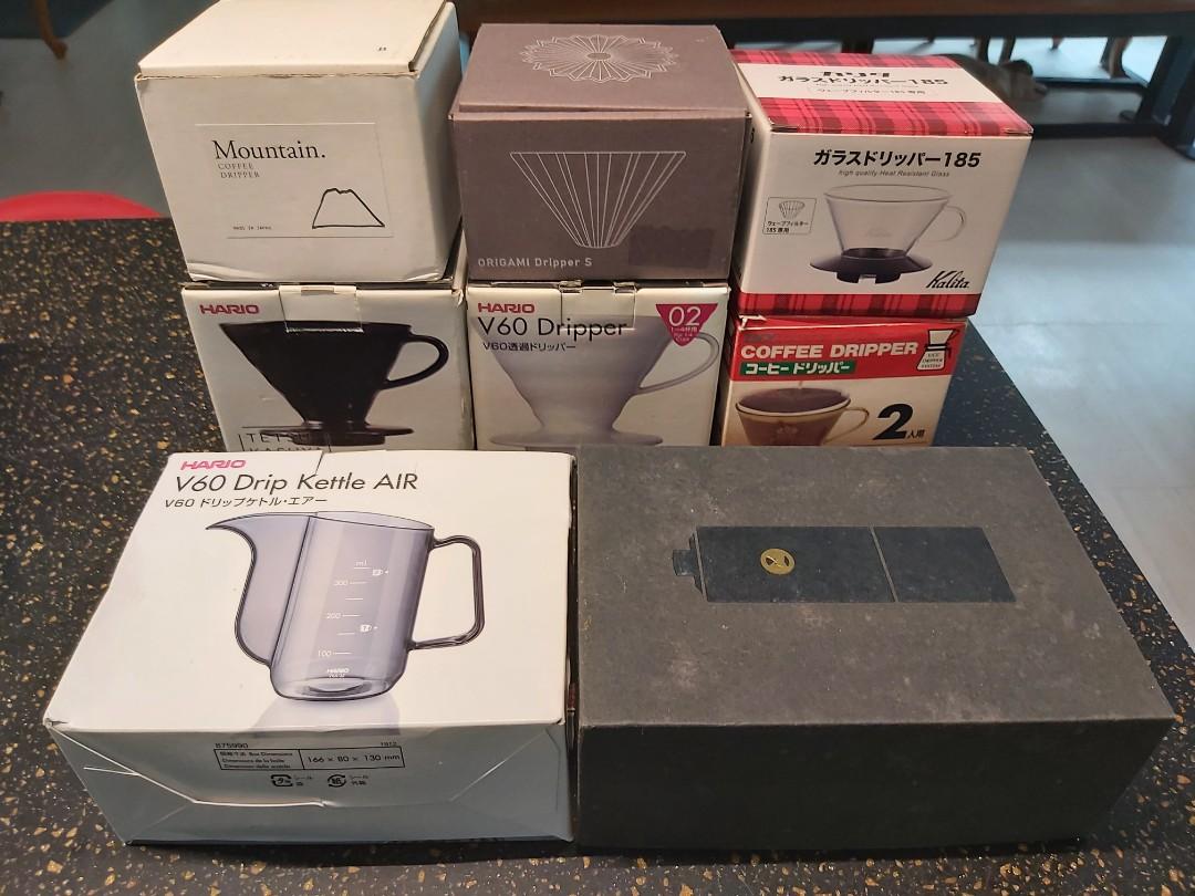 Coffee Dripper Grinder Kettle (Category: Coffee & Tea Tableware) located in Bocaue. Submitted by carloyacob (Listing ID 1119070666, Image 2). Description: Finding a new home for my slightly used and stored drippers, grinder, and kettle: Php 3,000.00 if bought as a set! White V60 Dripper Ceramic - 1000 UCC Plastic Dripper - 400 Red Origami Dripper S with Resin Holder - 2000 Ships from Bulacan on Weekdays Makati on Weekends.
